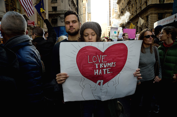 Despite their anger, demonstrators also expressed idealism about the nation’s ability to contain what they fear could be the worst from a Trump presidency. Photo by Donna Aceto.