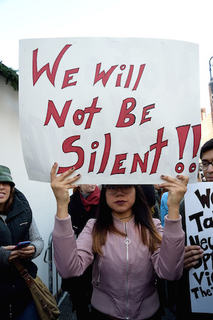 Many demonstrators were fierce in their commitment to oppose Trump going forward. Photo by Donna Aceto.