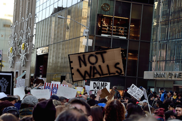 Demonstrators pressed up against the barricades set up around Trump Tower on Nov. 12. Photo by Donna Aceto.