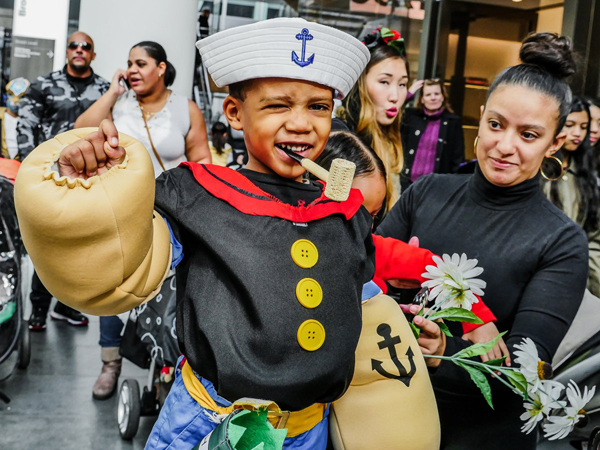 Photo by Milo Hess Pint-sized Popeye Veron Wilkinson, 4, flexes his muscles at Brookfield Place's early Halloween bash on Oct. 29.