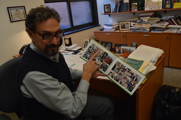 Stephan Russo, with a scrapbook that includes pictures from his days four decades ago in the Peace Corps | JACKSON CHEN 