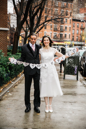 Jennifer and Wesley outside their Penn South home, on the day of the wedding: Dec. 22, 2015. Photo: Jenny MacFarlane, stylishhipweddings.com.