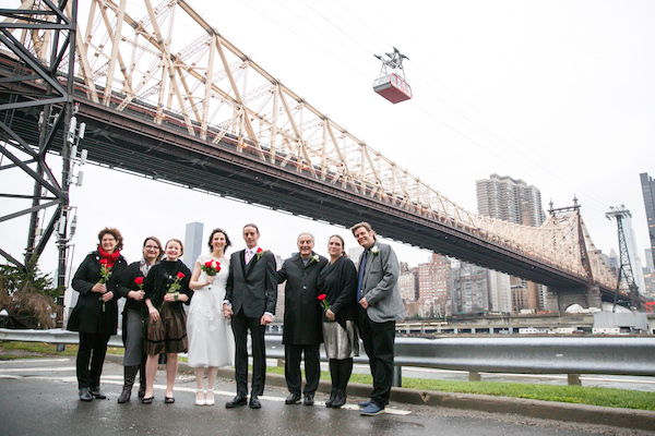 L to R: Linda Hemphill, maid of honor; bridesmaids Kimberly Kovach Allen and daughter Amelia; the bride and groom, Jennifer Dreussi Hansen and Wesley Francis Hansen; Cono Trubiano, Wes’ dad; Khadeeja Hansen, sister-in-law; John Hansen, Wes’ brother and best man. Photo by Jenny MacFarlane/stylishhipweddings.com.