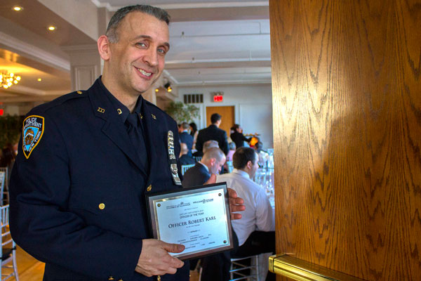 Police Officer Robert Karl, of the 10th Precinct. Photo by Zach Williams.