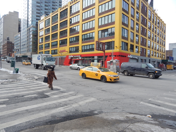 A woman was killed in December when a truck traveling northbound on 10th Ave. turned onto W. 39th St. and struck her in the crosswalk to the upper right of this photo. Photo by Sean Egan.