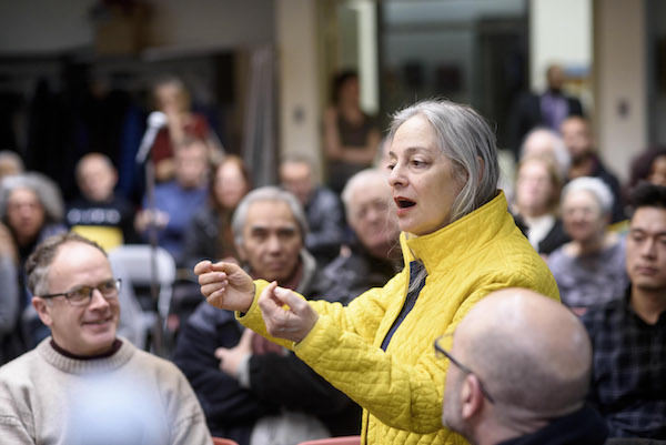 Hell’s Kitchen resident Maury Sherman (standing) asked, "Where is the Bad Landlord School that they all go to?" Photo by Jordan Rathkopf.