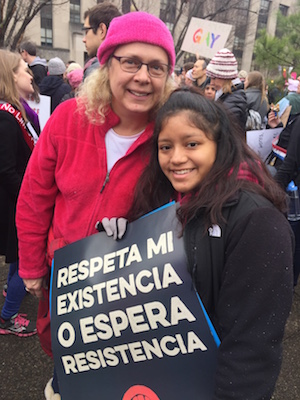 Accalia Frey, age 17, pictured with her mother Jody, isn't old enough to vote but that did not stop her from speaking out in support of Hillary. Photo by David Puchkoff.