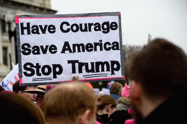 Of the thousands of signs seen at the March, this one offered a simple three-point plan. Photo by Donna Aceto.