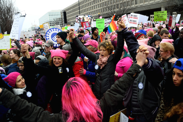 Hands were joined together and women were in lock step at the Women’s March on Washington. Photo by Donna Aceto.