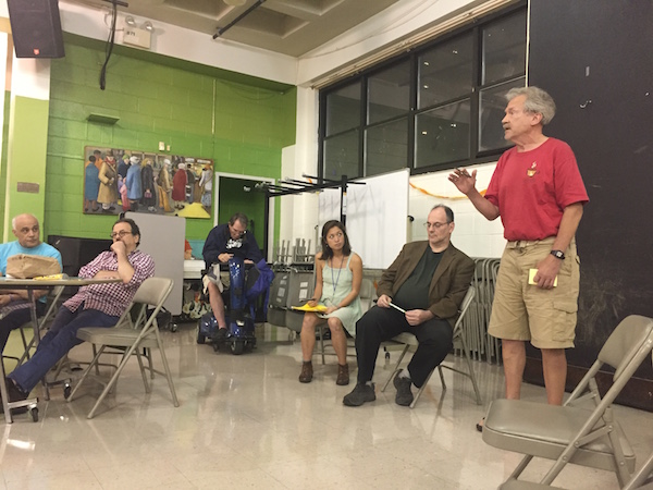 At an Oct. 19, 2016 CB4 Transportation Planning Committee meeting, Stanley Bulbach (standing) made it “perfectly clear” that his residential neighborhood does not support a plan that would detour vehicles to their side streets. Photo by Dennis Lynch.