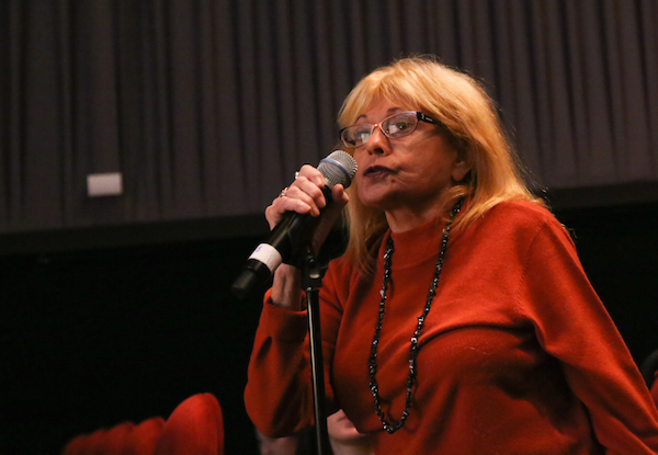 An audience member at the forum asked how she can help defeat Donald Trump and extremism. Photo by Tequila Minsky.