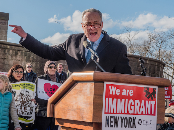 Chuck Schumer, the Senate minority leader, spoke to a Battery Park crowd, many of whom felt he was not resisting the new Trump administration as strongly as he should. Photo by Milo Hess.