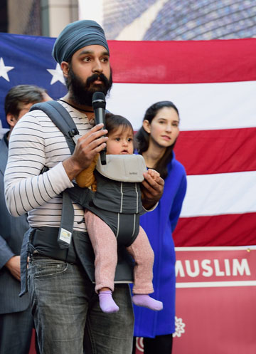 Professor Simran Jeet Singh, a Sikh professor of religion at Trinity University, with his daughter Gia. | DONNA ACETO