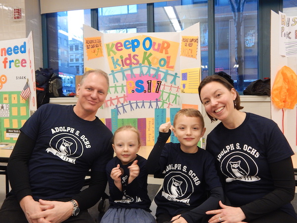 Trevor Richardson, Laura Voss, and their children Julian and Eliza represented the effort to provide air conditioning to crucial areas of PS 111. Photo by Sean Egan.