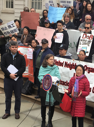 Margaret Chin, front row right, and Helen Rosenthal, to her left, were among the councilmembers at a City Hall rally last week calling for speedy passage of the STS package of anti-harassment bills. At left is Rolando Guzmán of Brooklyn’s St. Nick’s Alliance. Photo by Joaquin Cotler.