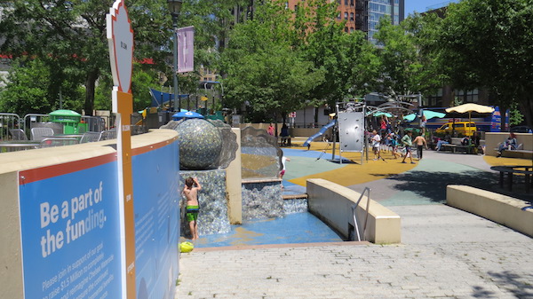 Chelsea Waterside Playground in its current form, with signage indicating things to come. Work is expected to begin fall 2016 and last about six months. Photo by Ted Gorodetsky. 