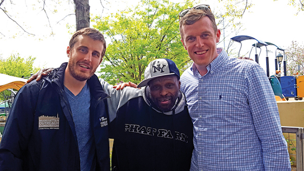 With the help of Breaking Ground's outreach teams, Robert, center, got a placement in permanent supportive housing at a building in the Bronx after living on the streets. Bryan Tarabochia, left, and Doug Becht, right, of Breaking Ground. Photo by Dusica Sue Malesevic.