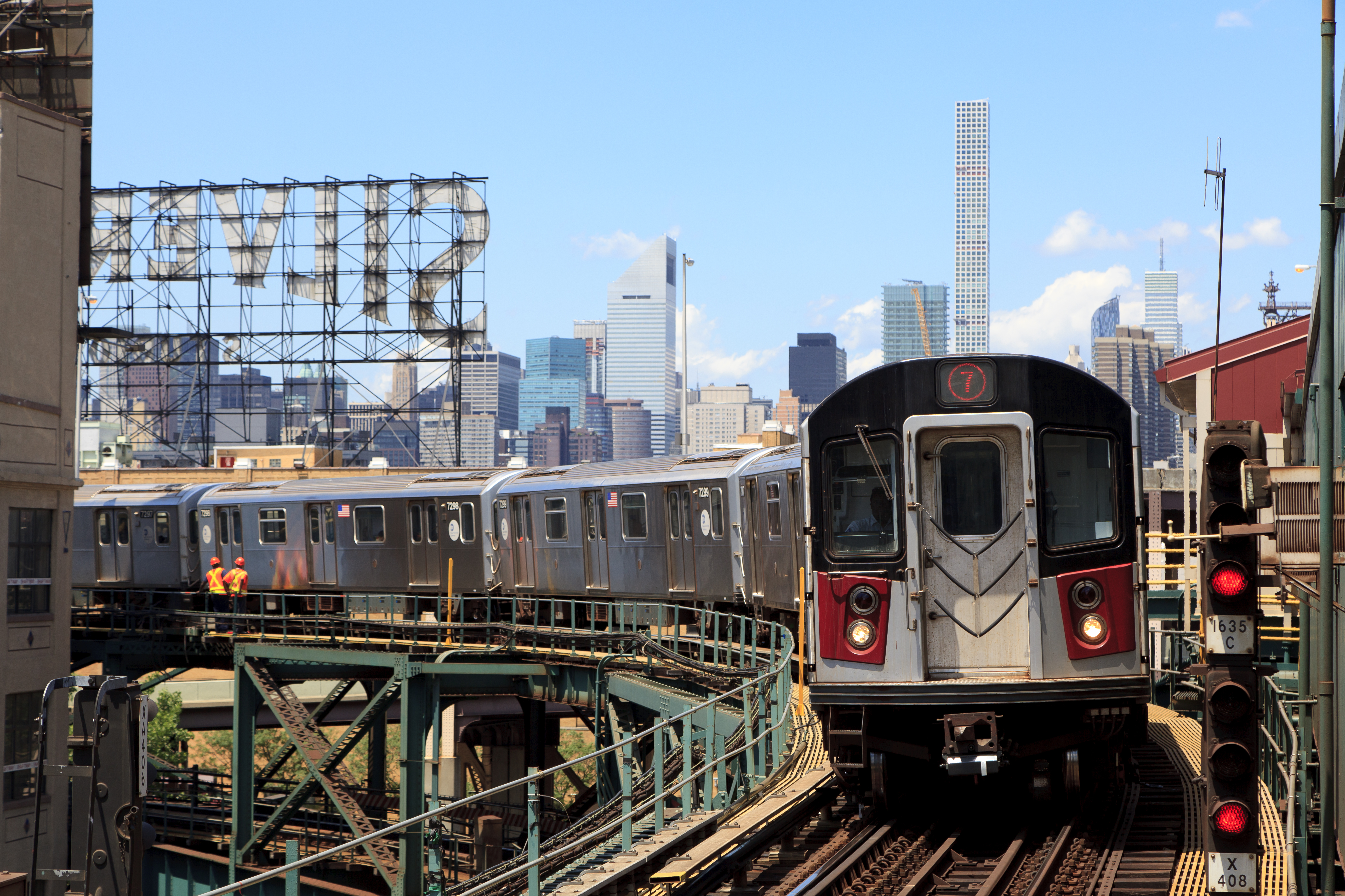 7 Train, Exchanging riders along the way to Fushing. Queens…