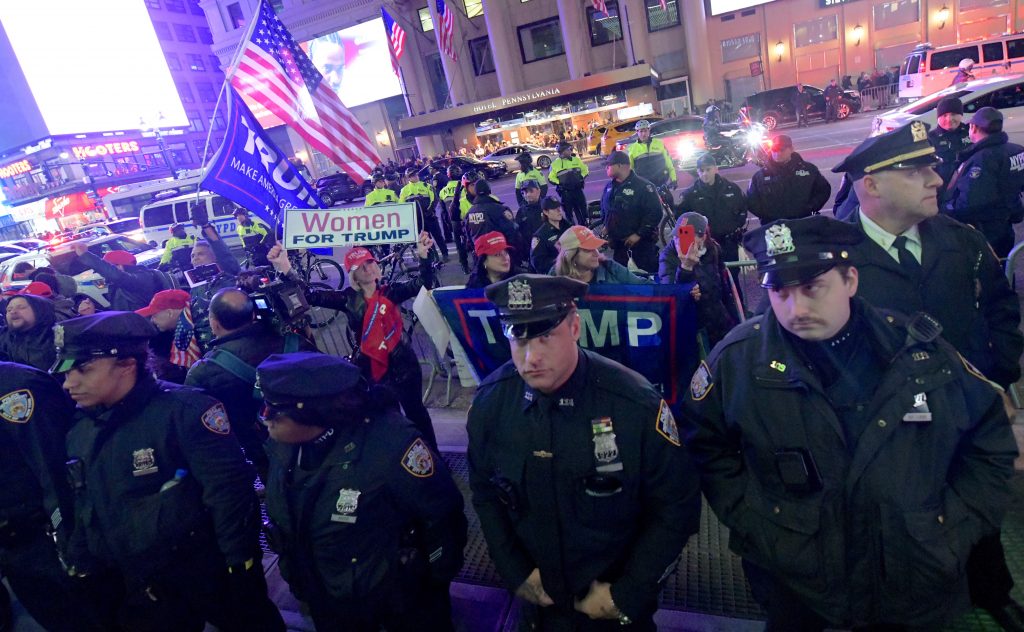 Dueling Protestors At MSG As Prez Trump Attends Wrestling Match | AmNewYork