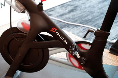 FILE PHOTO: A Peloton exercise bike is seen after the ringing of the opening bell for the company’s IPO at the Nasdaq Market site in New York City