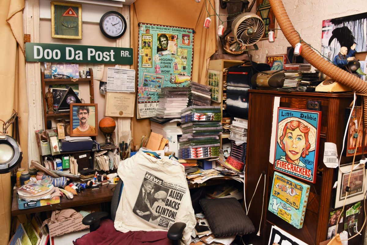 1/4 of Ed Higgins bedroom/studio. Higgins estimates that he created about 2000 paintings in that chair.