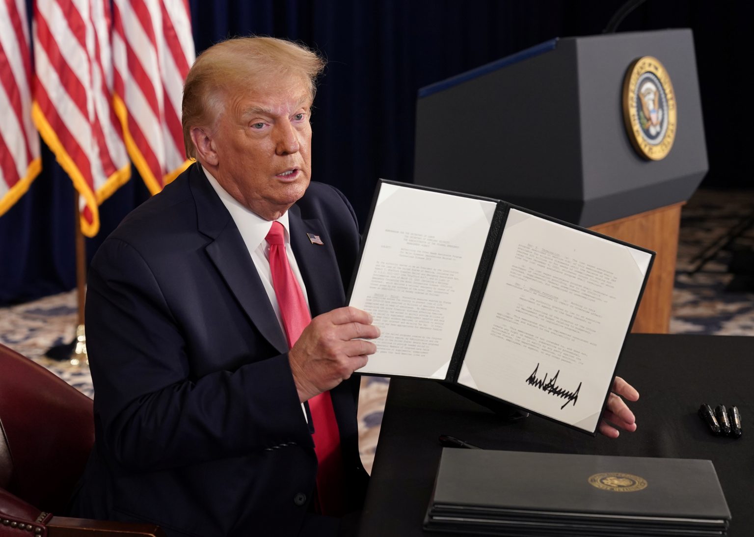 Trump’s economic executive orders prompts questions over validity and