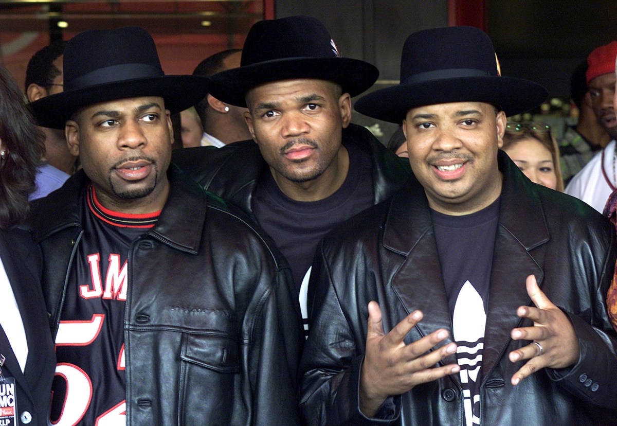 Members of the musical group RUN-DMC, Jason Mizell (Jam Master Jay), Darryl McDaniels (DMC) and Joseph Simmons