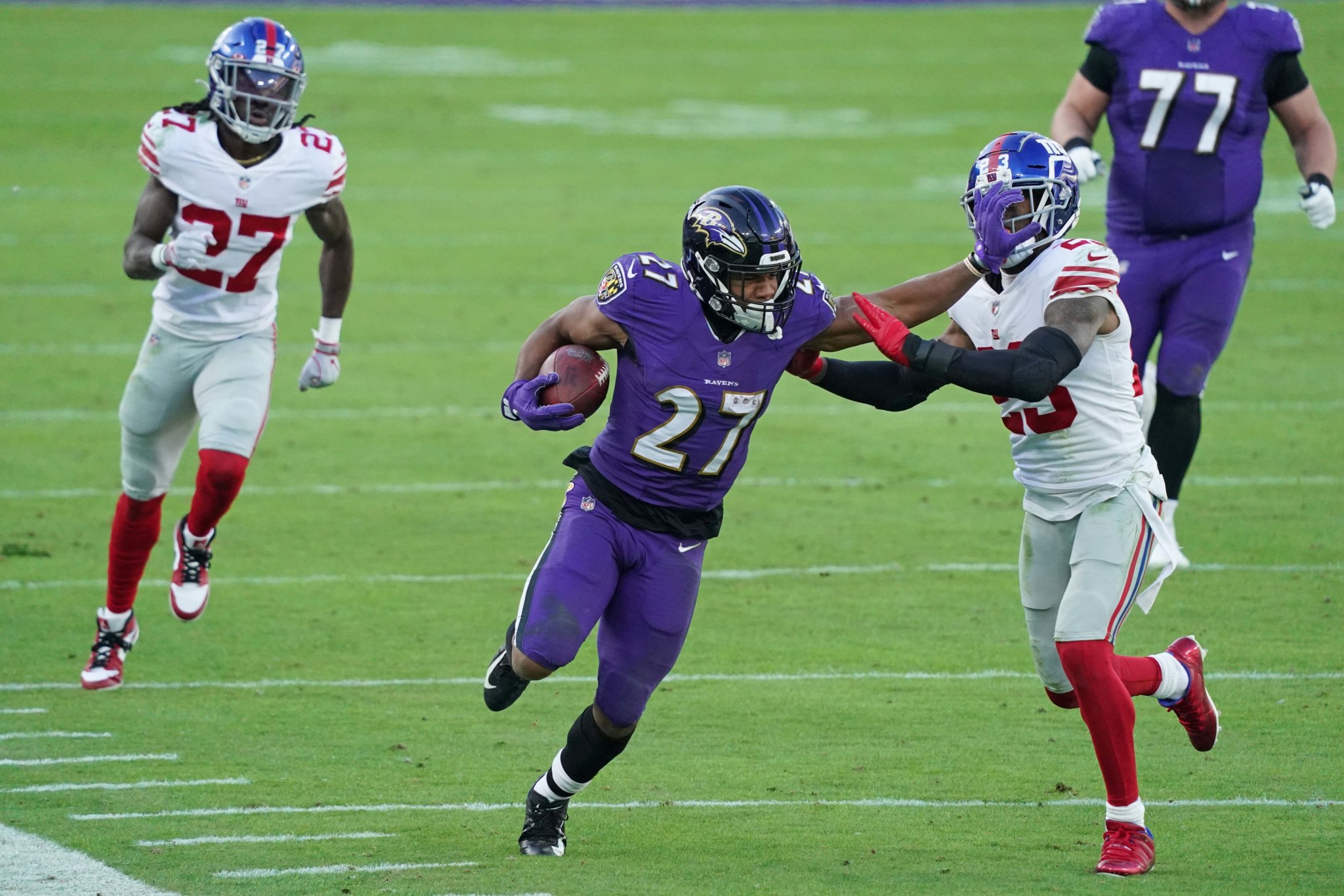 Giants run over by Ravens, all but eliminated from playoff contention