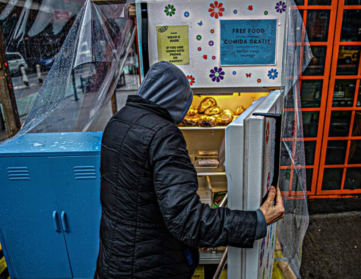 The community fridge creates a more humane experience, allowing individuals to grab what they need without waiting on long lines