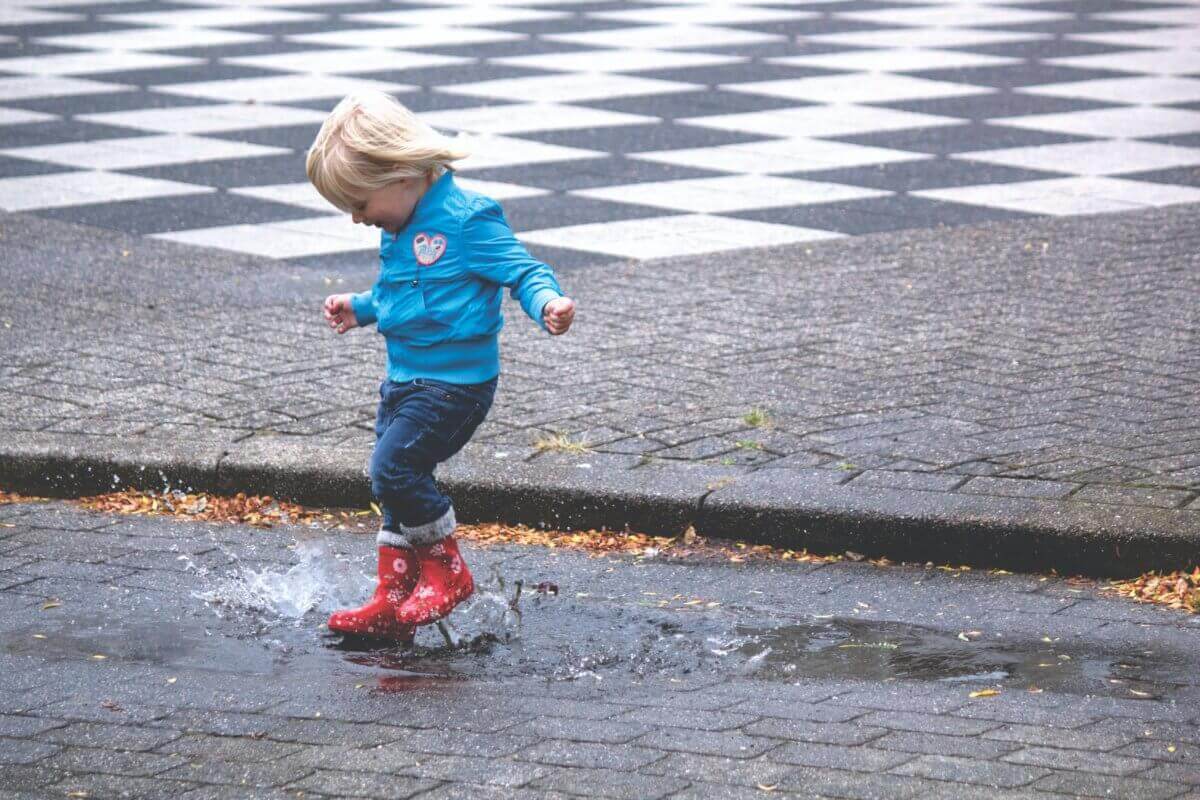 black kids playing in the rain