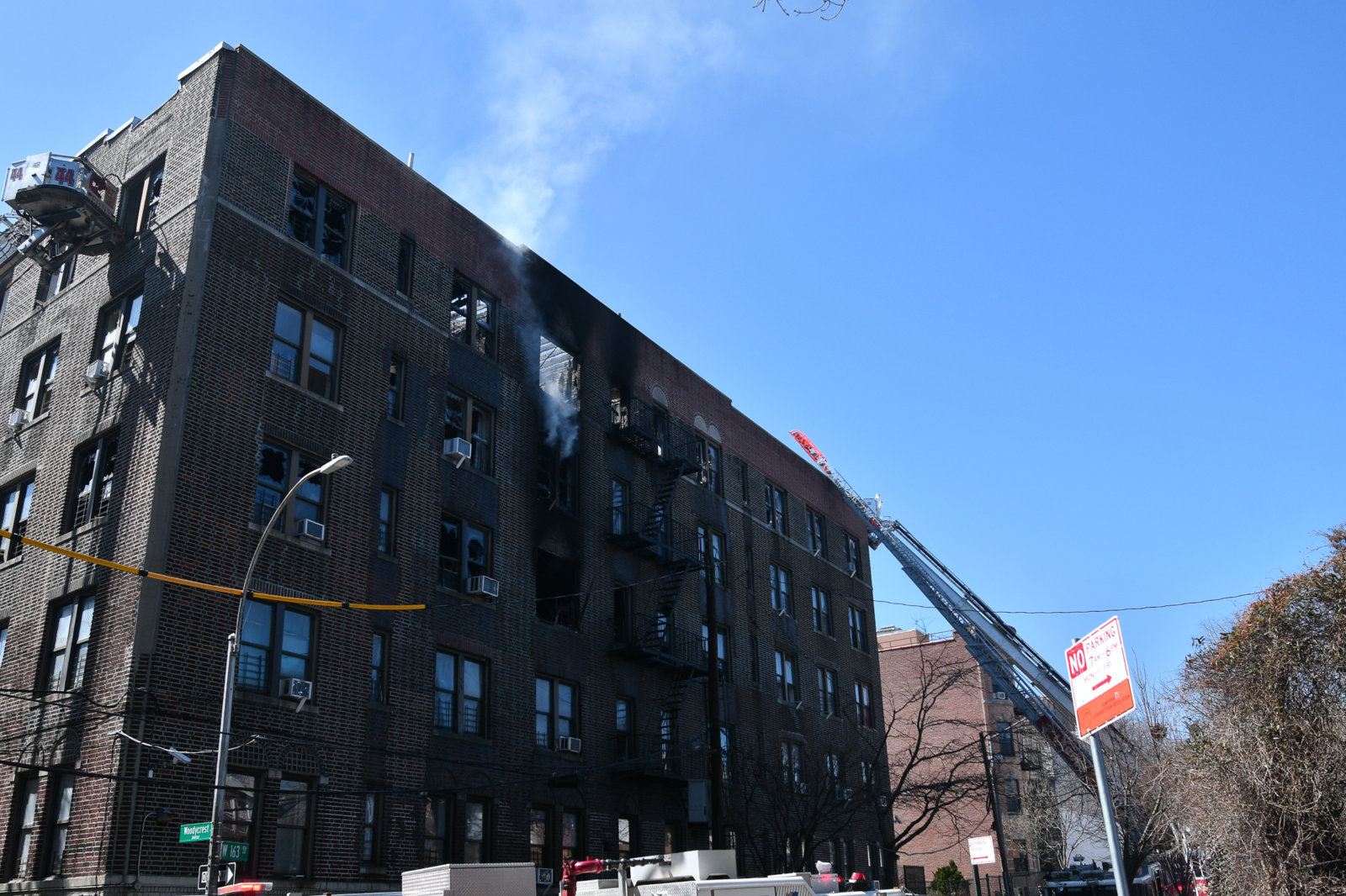 Nine injured after three-alarm fire engulfs Bronx apartments | amNewYork