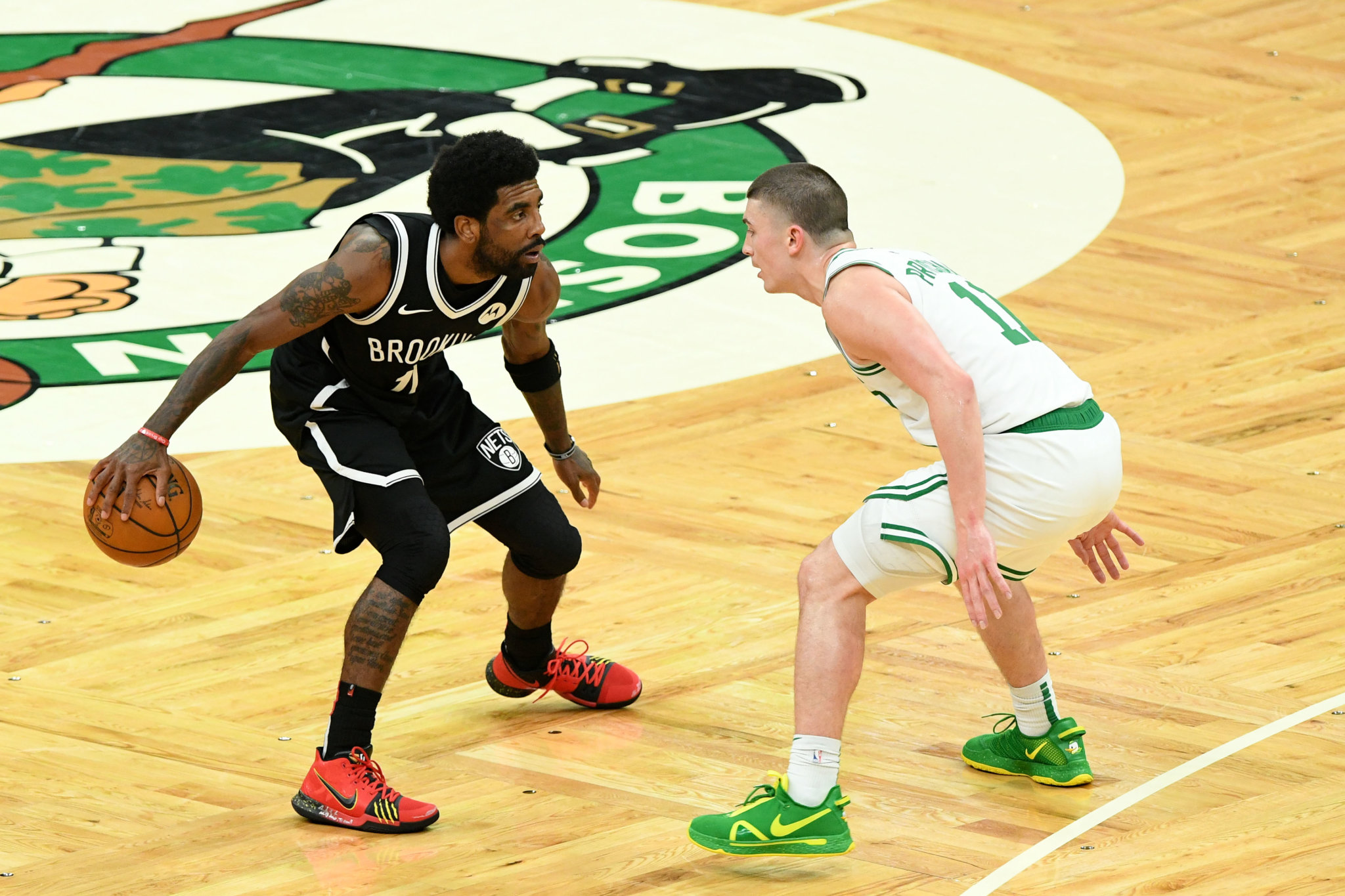 Fan at TD Garden detained, cuffed for throwing water bottle at Kyrie Irving  after Game 4