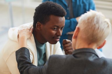 African Young Man in Support Group