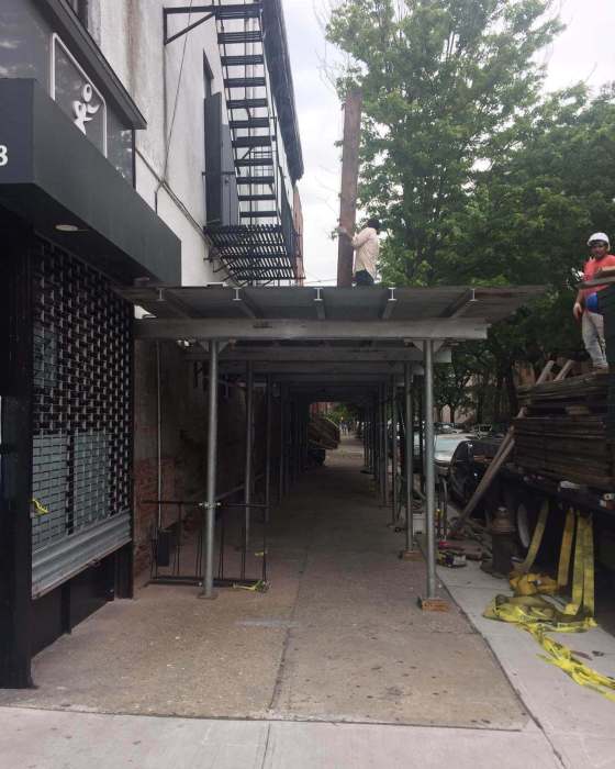 A photo from a now-deleted June 12 Facebook post by the gym shows construction work on the Union Street side and a section of brick missing near the base of the building.