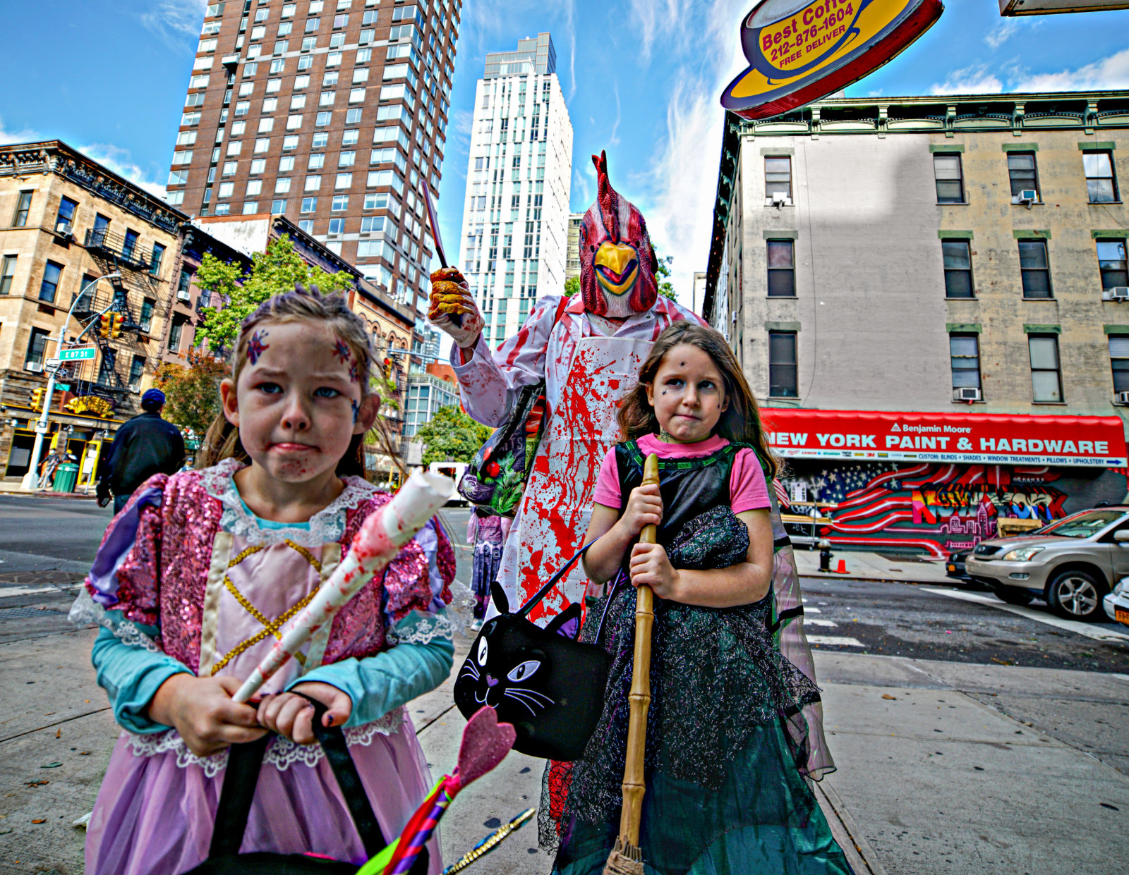 TRICK OR TREAT! Ghosts and goblins of all ages venture across Manhattan