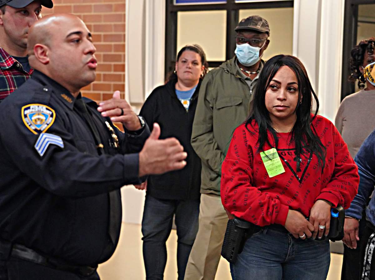 An officer answers questions after the exercise