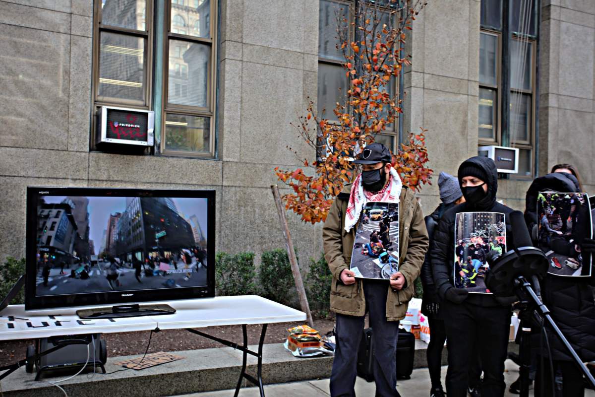 Protesters watched the footage