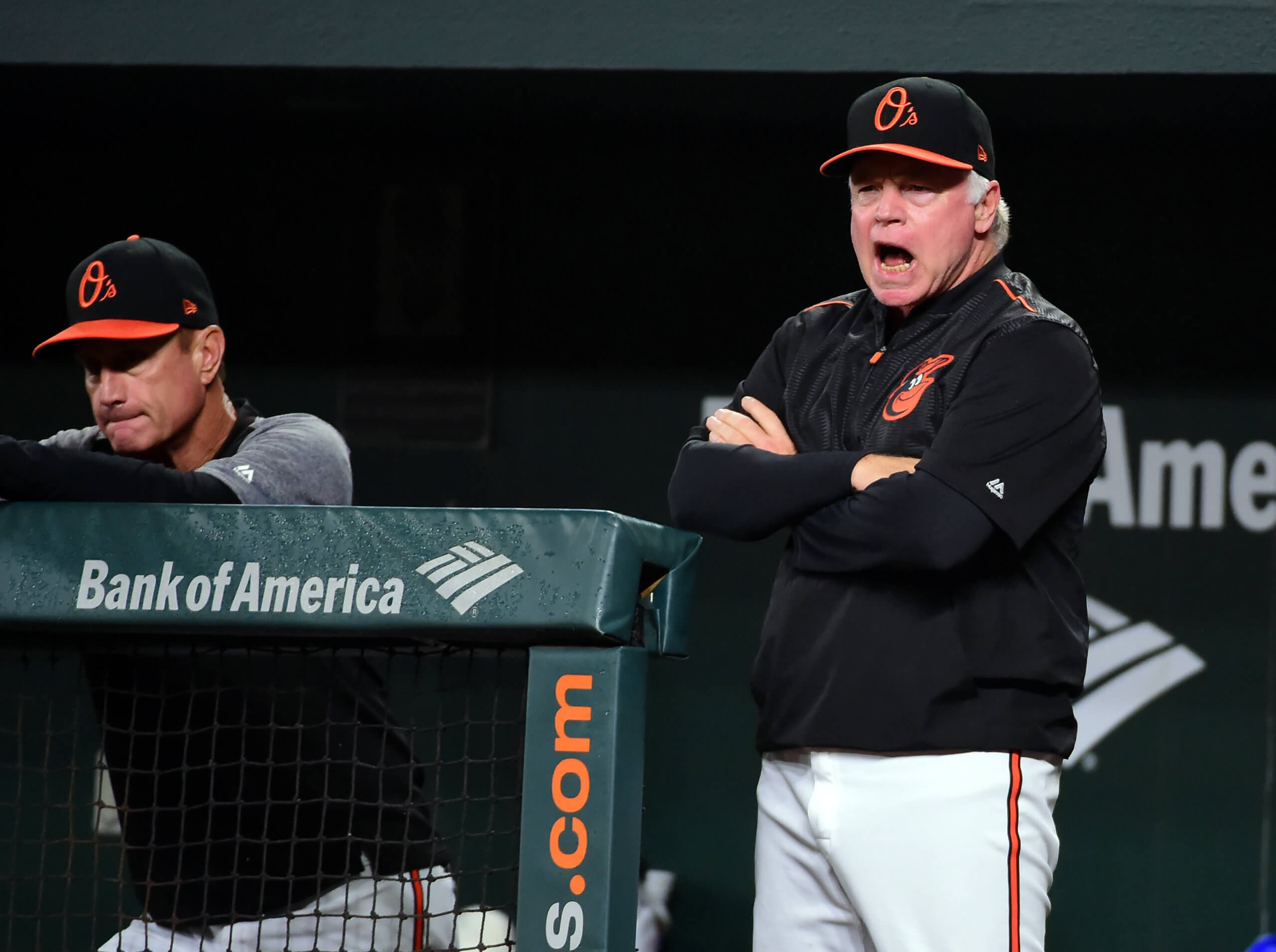 Baltimore Orioles red faced manager Buck Showalter nose to nose