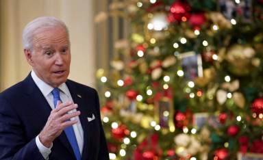 FILE PHOTO: U.S. President Joe Biden speaks about the country’s fight against COVID-19, in Washington