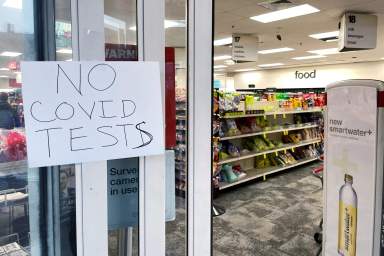 FILE PHOTO: A hand written sign reads “No Covid Tests” in Somerville