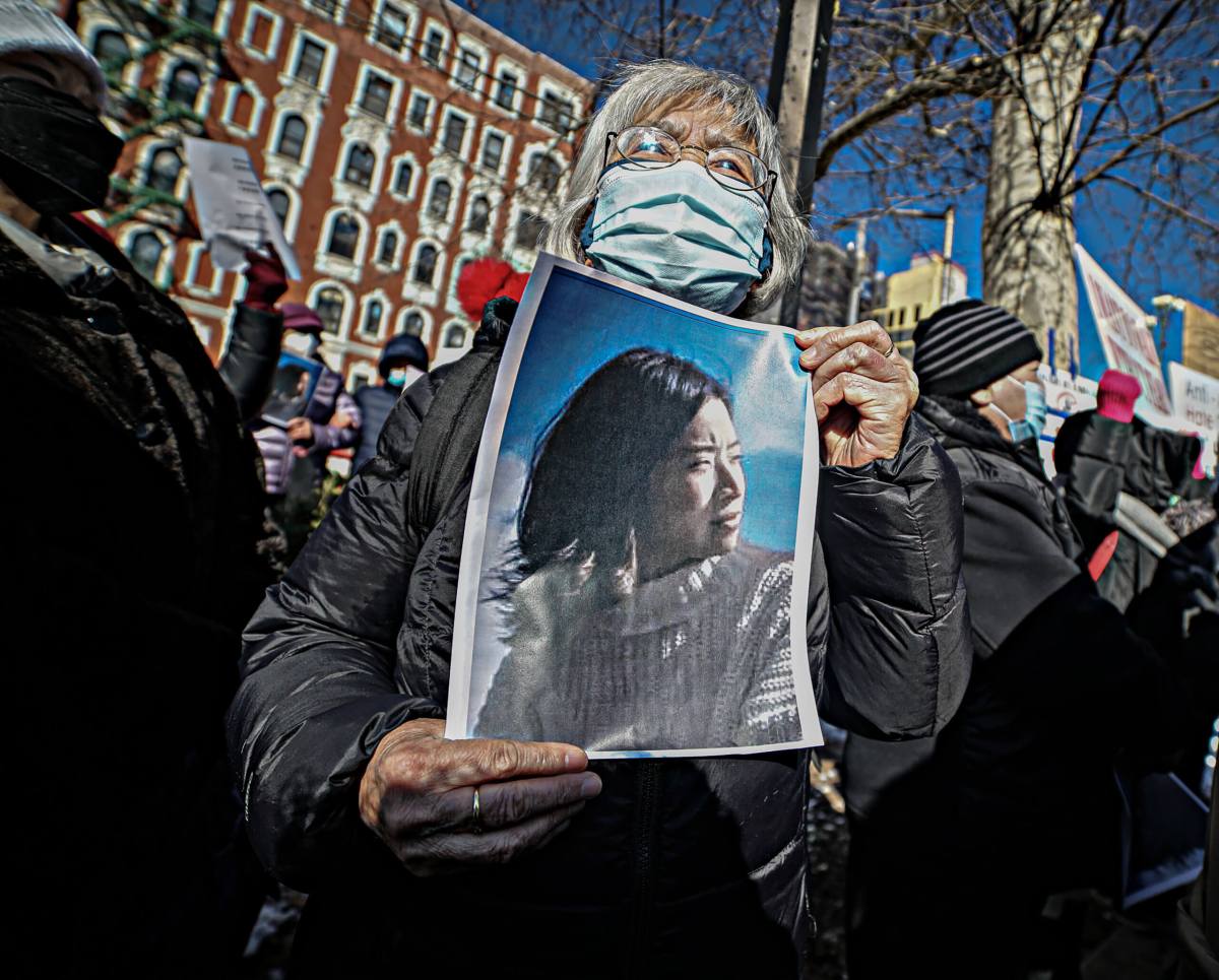 Residents clung to photographs of Christina Yuna Lee