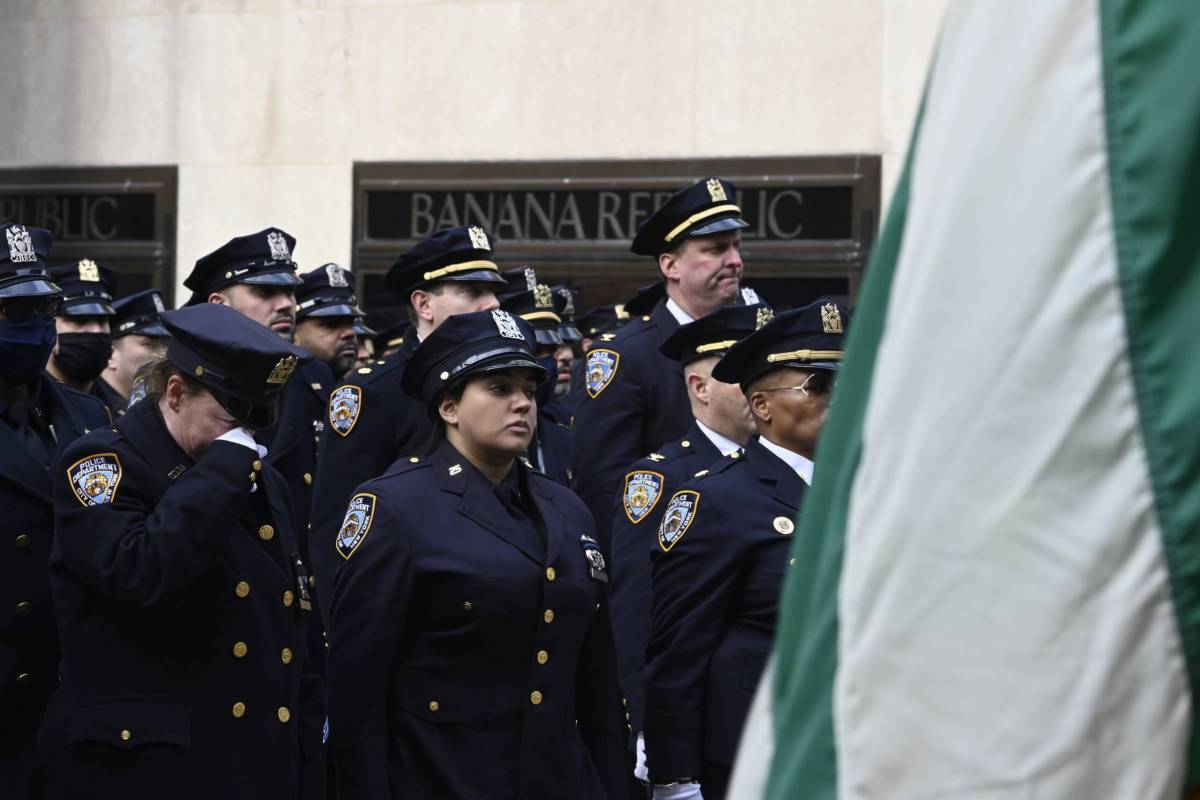 Officers burst into tears as Mora is laid to rest