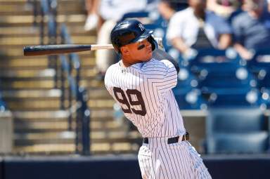 Yankees right fielder Aaron Judge hits a two run home run in the fifth inning against the Pirates in preaseason.