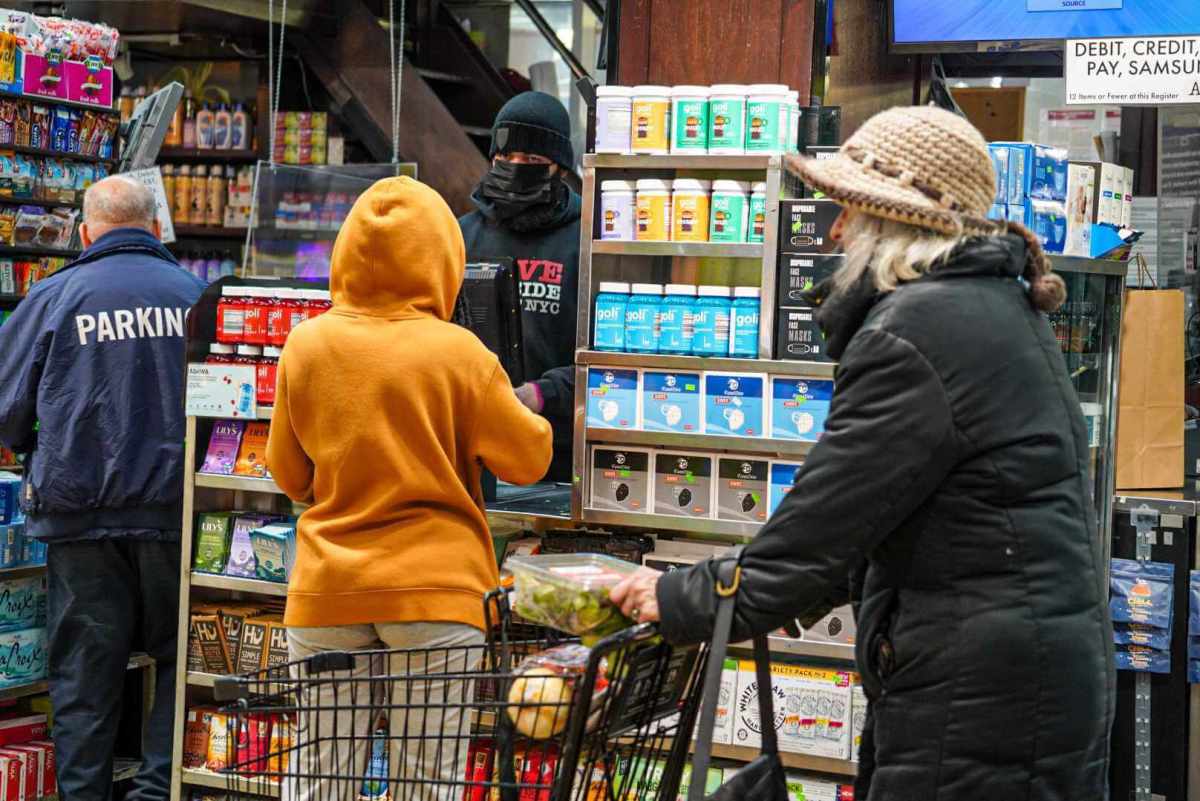 Waiting to pay for groceries at the 111th Street Market on the Upper West Side.