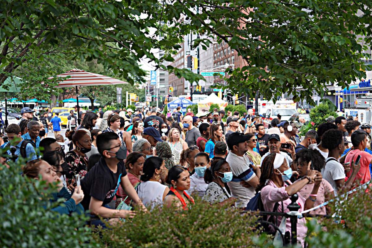 Hundreds gathered to watch the scene