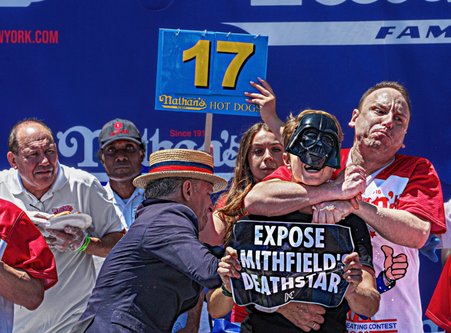 Choke job Joey Chestnut takes down protester, still wins another