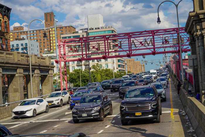 Drivers enter Manhattan from the Williamsburg Bridge