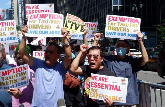 Taxi and for-hire vehicle drivers rally for exemptions from the state's congestion pricing plan in Midtown