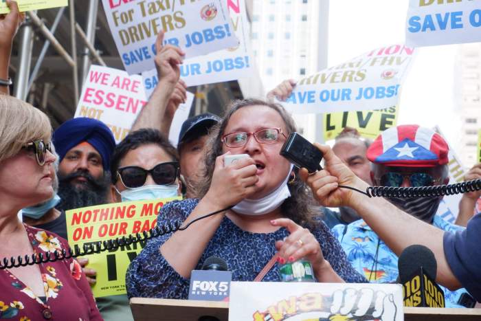 Bhairavi Desai, executive director of the New York Taxi Workers Alliance, speaks outside Gov. Hochul's Midtown office