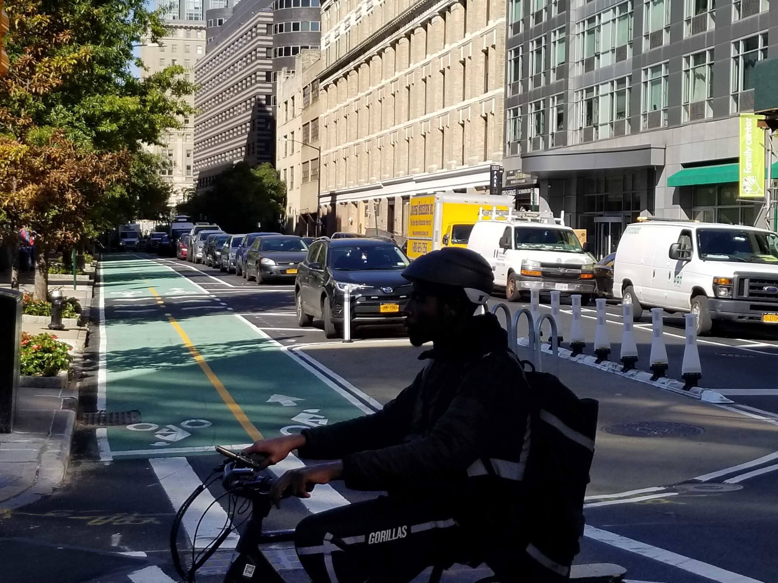 DOT cuts ribbon on newly fortified Schermerhorn Street bike lane amNewYork